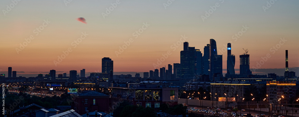 Russia. Moscow after sunset. Panorama of the city from the observation deck over the Andreevskaya embankment of the Moskva River