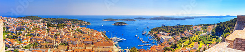 Coastal summer landscape, panorama - top view of the town of Hvar and the City Harbour with marina, on the island of Hvar, the Adriatic coast of Croatia