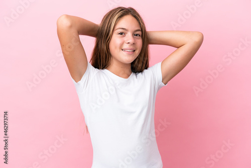 Little caucasian girl isolated on pink background laughing