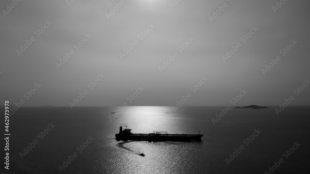 black and white silhouette shipping oil float in sea aerial view black and white silhouette shipping oil float in sea aerial view