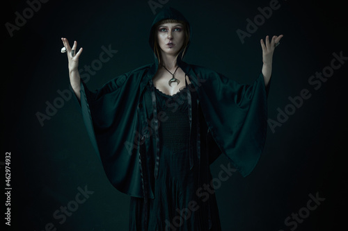 Εκτύπωση καμβά Young pagan witch, a moon priestess, performing a ritual, halloween and feminini