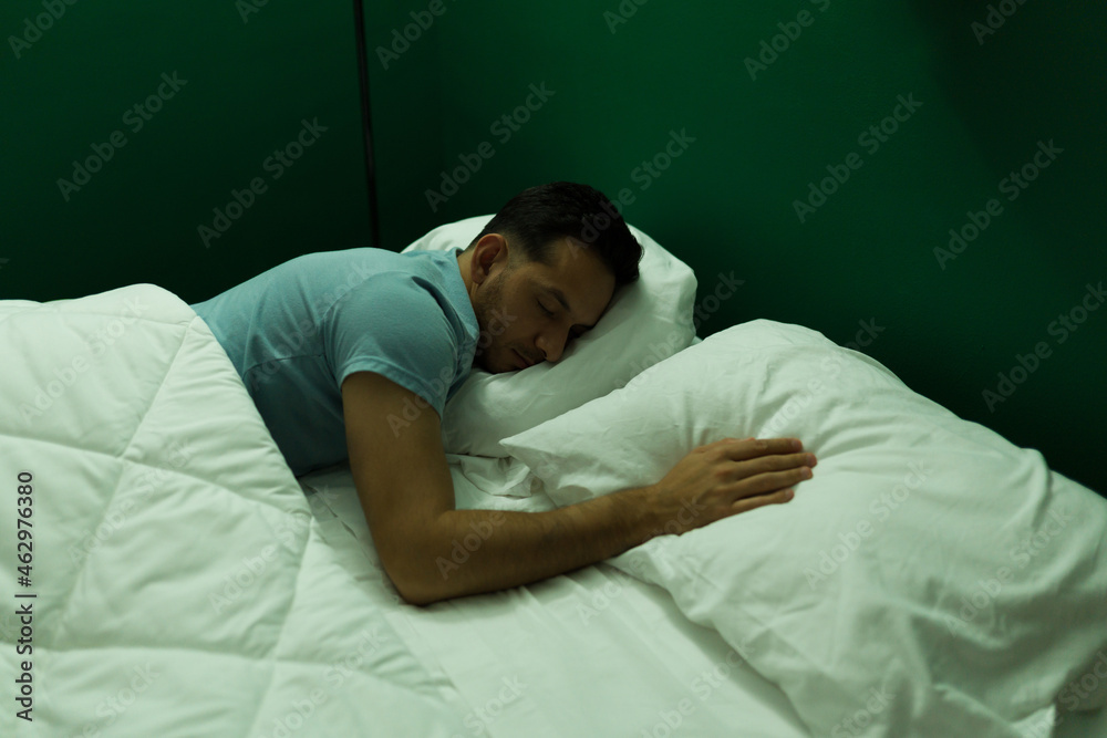 Hispanic man sleeping without his wife Hispanic man sleeping without his wife