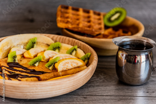 Healthy breakfast, crepe, green juice and fresh fruit