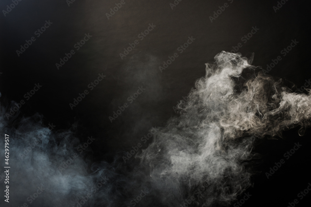 Dense Fluffy Puffs of White Smoke and Fog on Black Background, Abstract Smoke Clouds Dense Fluffy Puffs of White Smoke and Fog on Black Background, Abstract Smoke Clouds