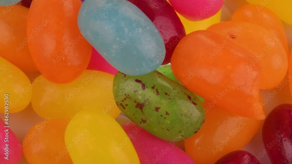 Closeup of jelly beans. Jelly candies. Full frame background. Rotating. View from above - overhead. Extreme close-up Closeup of jelly beans. Jelly candies. Full frame background. Rotating. View from above - overhead. Extreme close-up