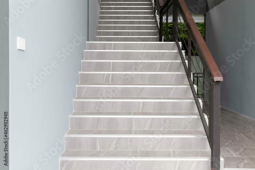 Brown granite stairs inside a modern luxury hotel