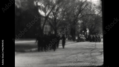 American GI Salutes and Joins the Army 1943 - An American GI salutes to the camera and joins the war effort during WWII.