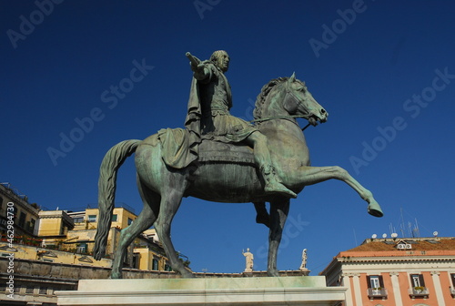 Napoli (naples) sights and mount vesuvius with statues in italy