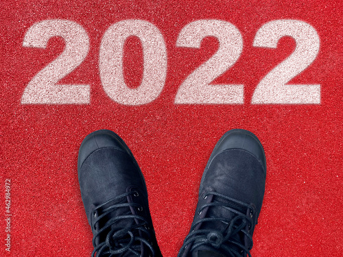 Black shoes on 2022 concrete background, Startup, plans and success in this year