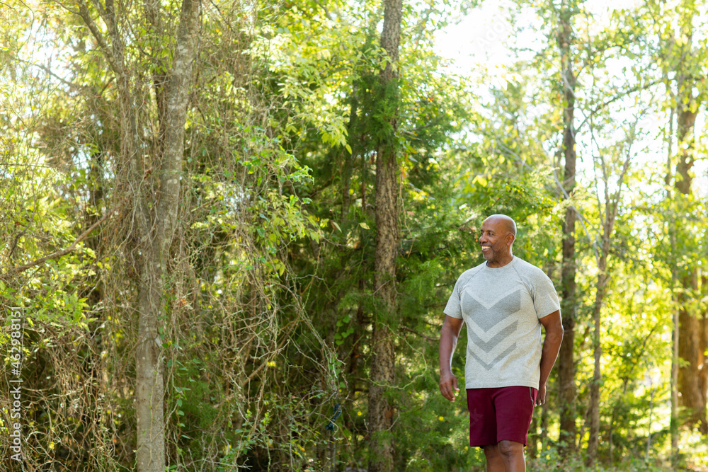 Mature African American man taking a walk outside.