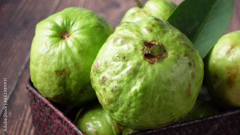 many guava in a bowl on table top view many guava in a bowl on table top view