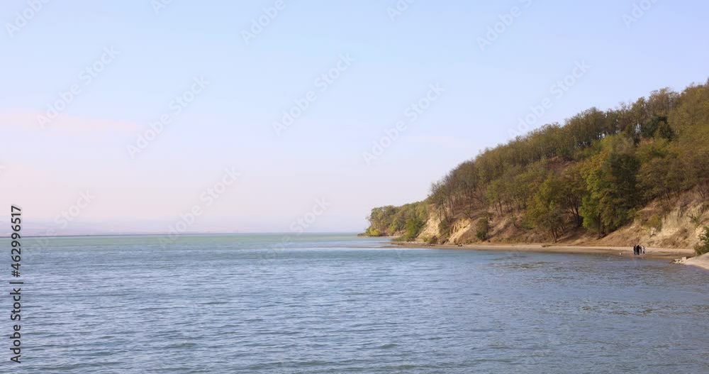 Group Of Tourists On The Shore Of The River At Daytime. timelapse Group Of Tourists On The Shore Of The River At Daytime. timelapse