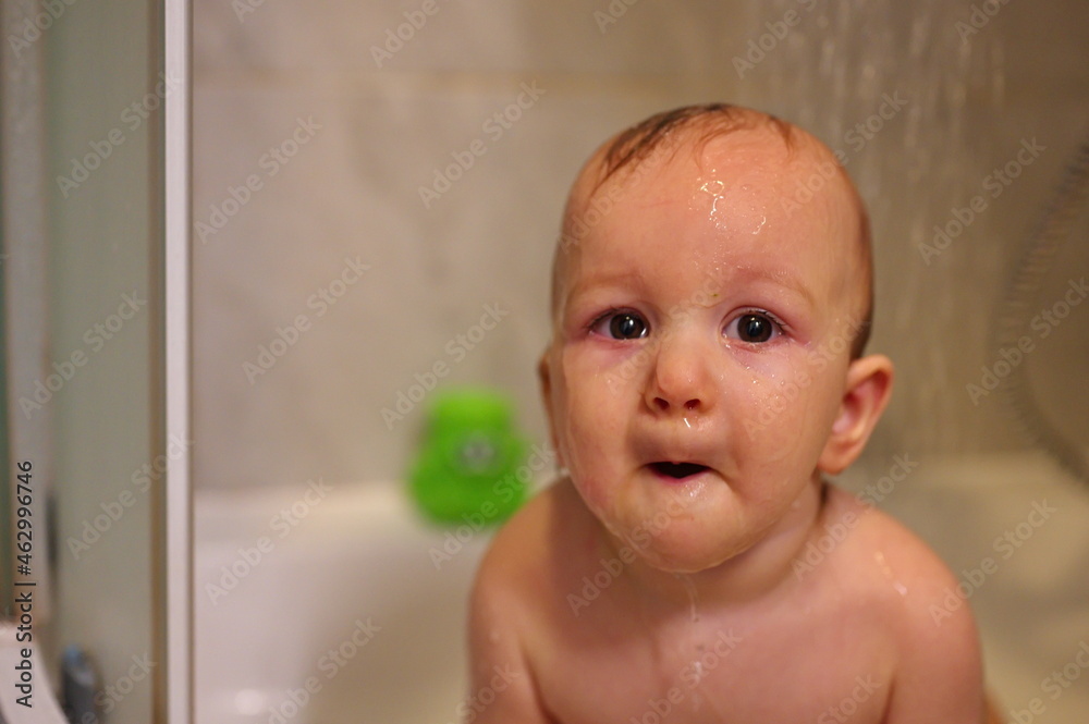 Portrait of little boy washing in shower cabin Portrait of little boy washing in shower cabin