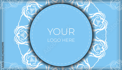 Greeting card in blue with vintage white ornaments prepared for typography.