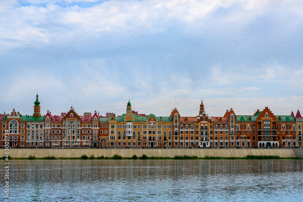 Houses on the Bruges embankment in the style of Belgian urban architecture in Yoshkar-Ola, Russia