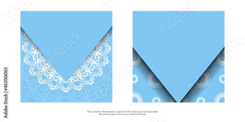 Blue greeting card with mandala white ornament prepared for typography.
