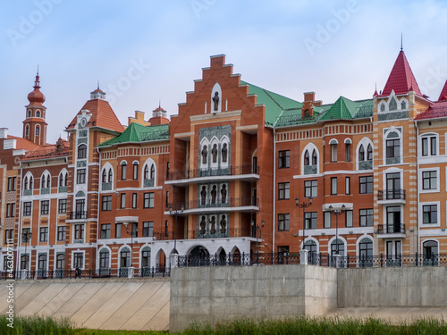 Houses on the Bruges embankment in the style of Belgian urban architecture in Yoshkar-Ola, Russia
