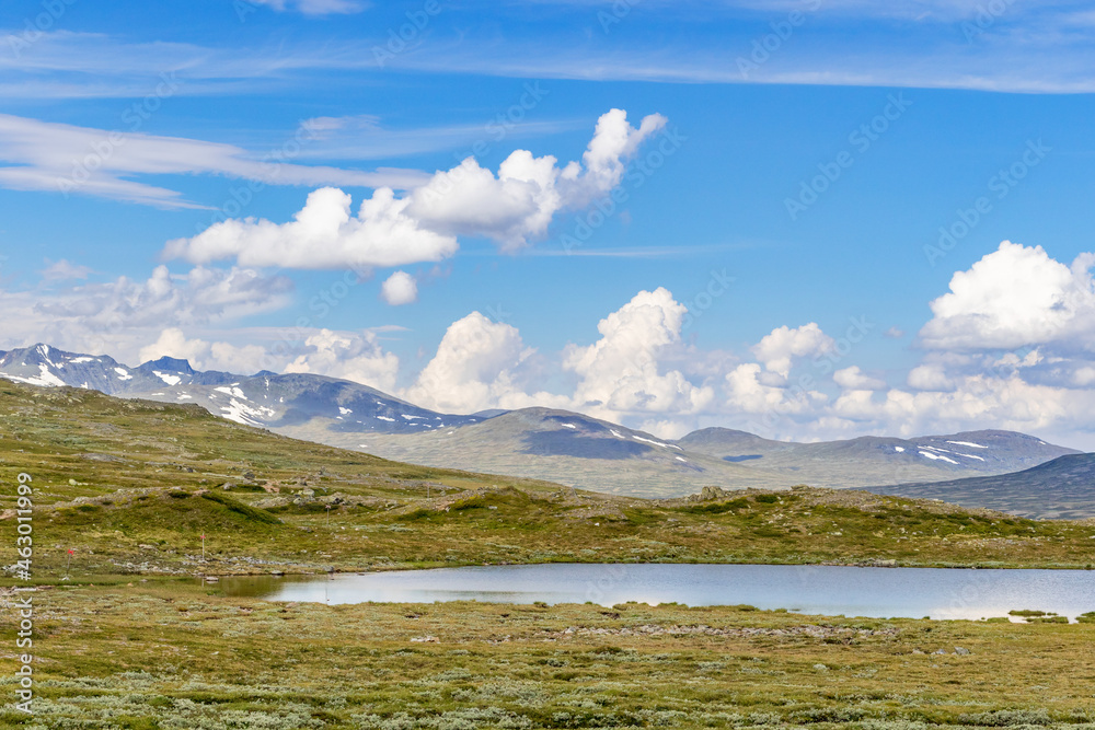 Mountain lake and a mountain ridge in the wilderness Mountain lake and a mountain ridge in the wilderness