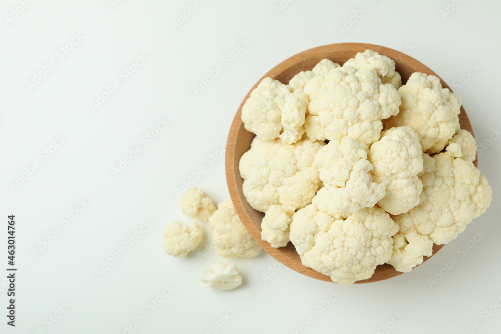Slices of fresh juicy cauliflower in bowl on white background Slices of fresh juicy cauliflower in bowl on white background