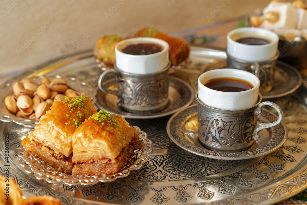 Traditional arabic dessert baklava with a cup of turkish coffee