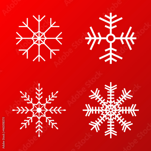 white snowflakes set with different shape on red background for winter decoration