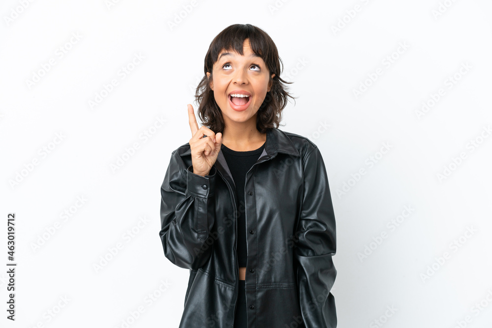 Young mixed race woman isolated on white background pointing up and surprised
