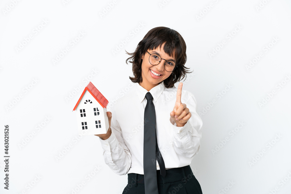 Real estate mixed race agent isolated on white background showing and lifting a finger