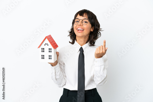 Real estate mixed race agent isolated on white background making money gesture