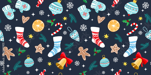 Christmas seamless pattern with festive elements. Christmas toys, fir branches, socks and bell.