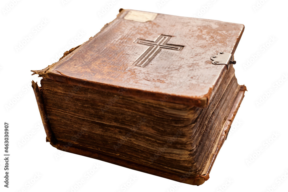 Fototapeta premium Old Large Worn Bible On White Background.