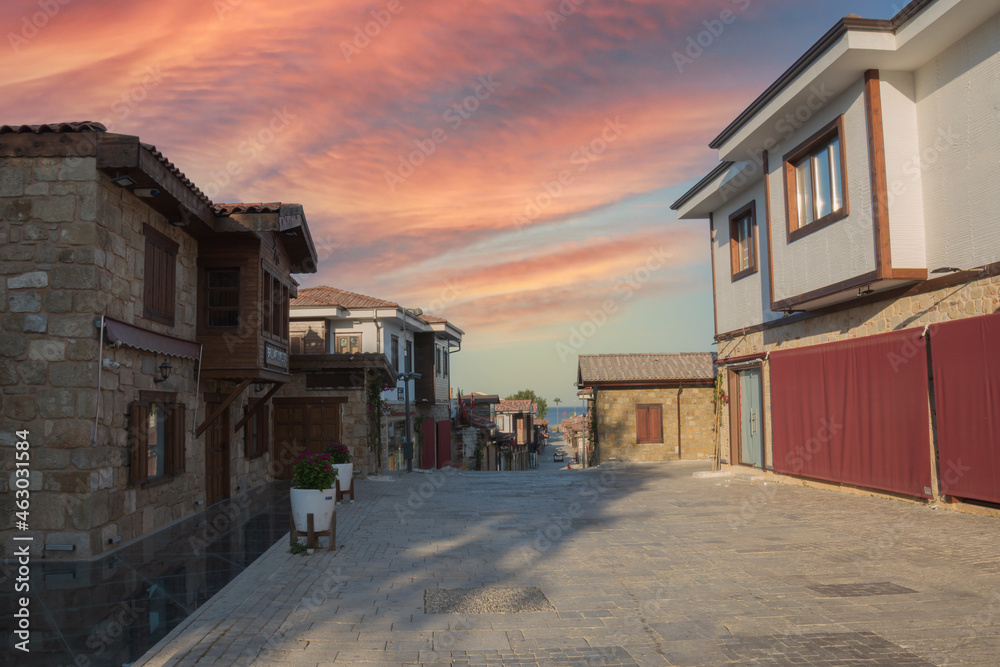 The streets of the city centre, the bazaar and the port area in Side, Antalya. Street views. Cloudy day