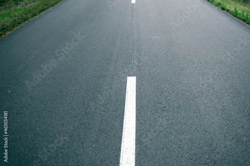Wallpaper Mural Close up of new asphalt road with lines in nature. Torontodigital.ca