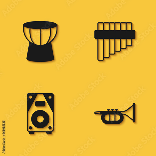 Set African darbuka drum, Trumpet, Stereo speaker and Pan flute icon with long shadow. Vector photo