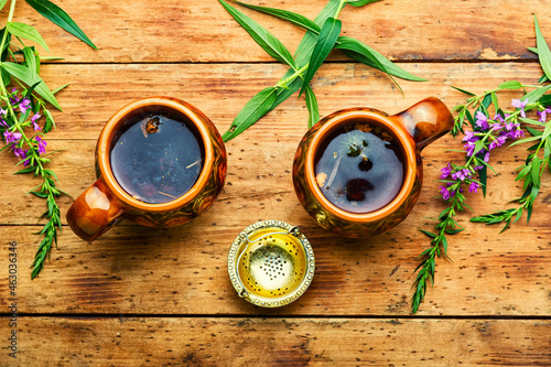 Healing fireweed tea,rustic wooden table