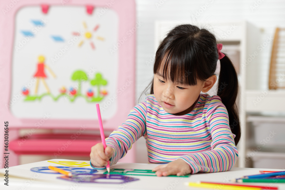 young girl drawing different shapes for homeschooling young girl drawing different shapes for homeschooling