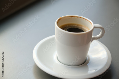 Close up of an unfinished cup of coffee.