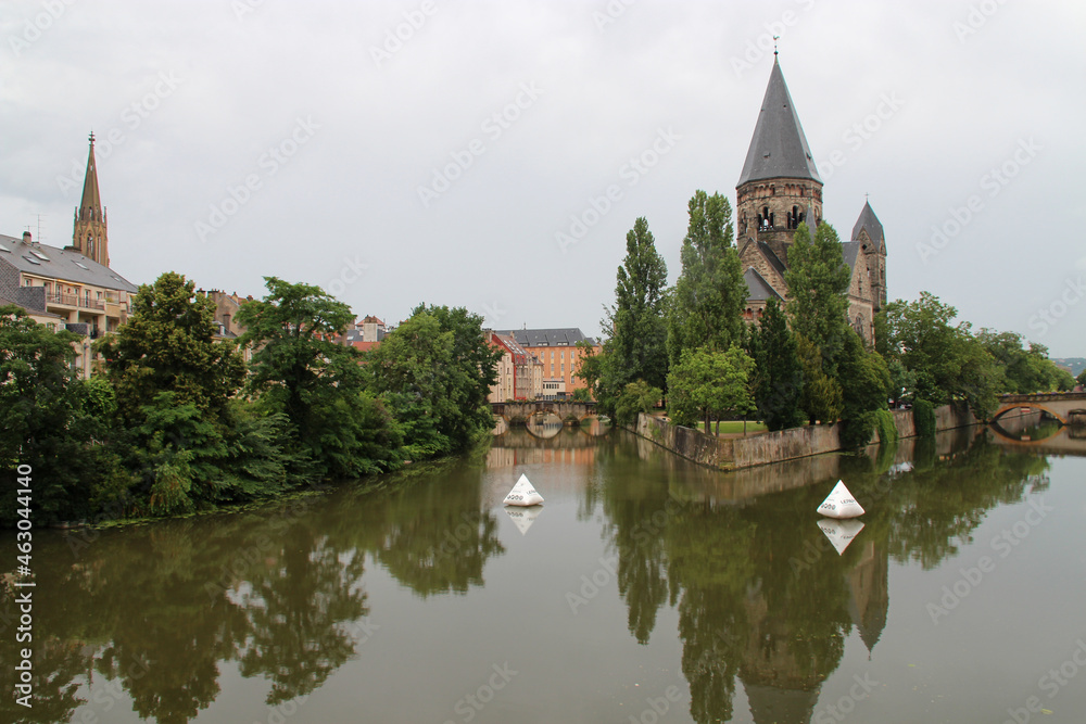 protestant church (temple neuf) and river moselle in metz in lorraine (france) 