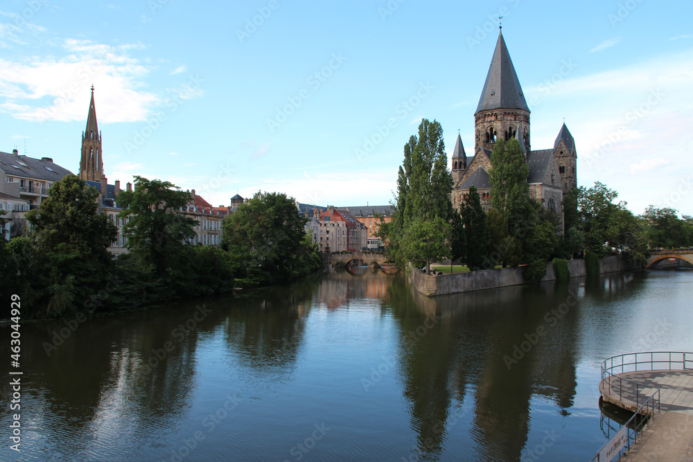 protestant church (temple neuf) and river moselle in metz in lorraine (france) 