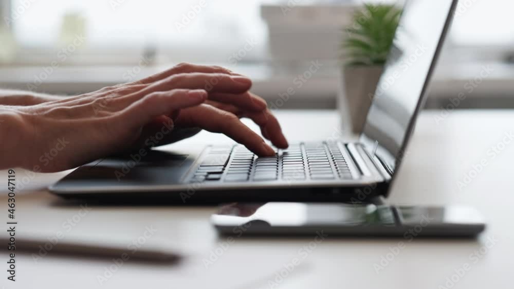 Online content. Digital marketing. Business intelligence. Digital analytics. Man hands typing on laptop keyboard working on Internet project at light workplace. Online content. Digital marketing. Business intelligence. Digital analytics. Man hands typing on laptop keyboard working on Internet project at light workplace.