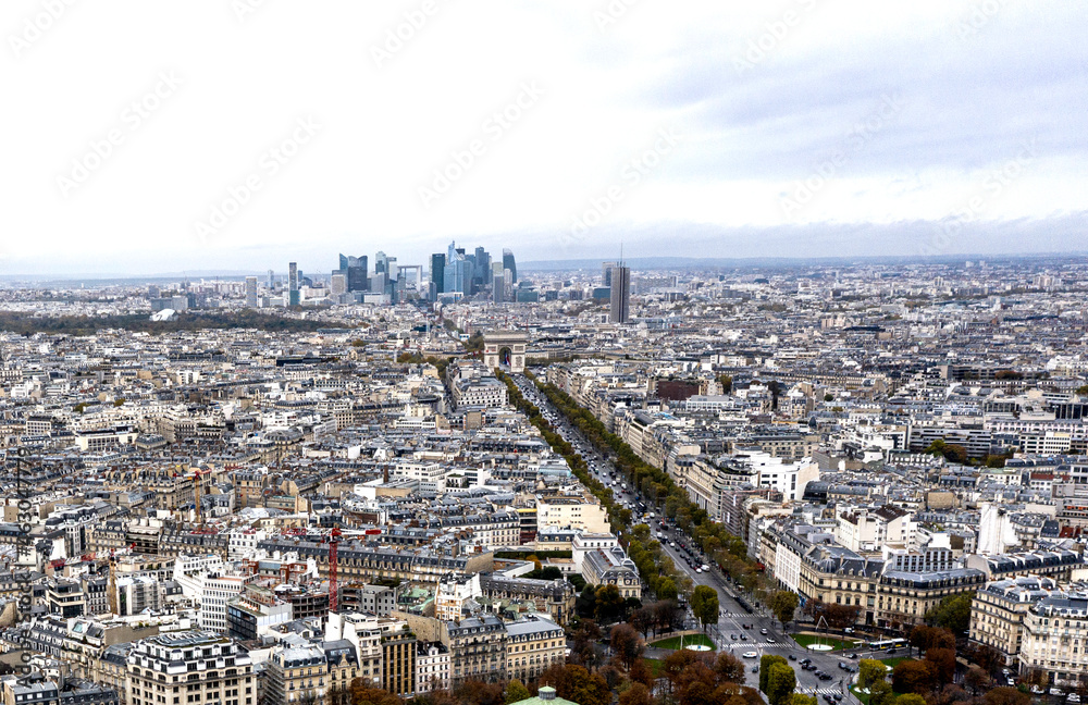Aerial view of Arc de Triomphe, Paris and defense neighborhood.