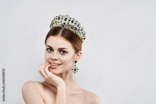 portrait of a woman naked shoulders jewelry cosmetics attractive look