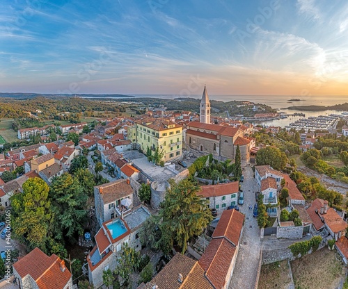 Drone panorama over the harbor of Croatian coastal town Vrsar in Istria during sunset