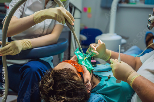 Man having teeth examined at dentists. Dental treatment in dentistry. Appointment at the dentist. lifestyle, real life