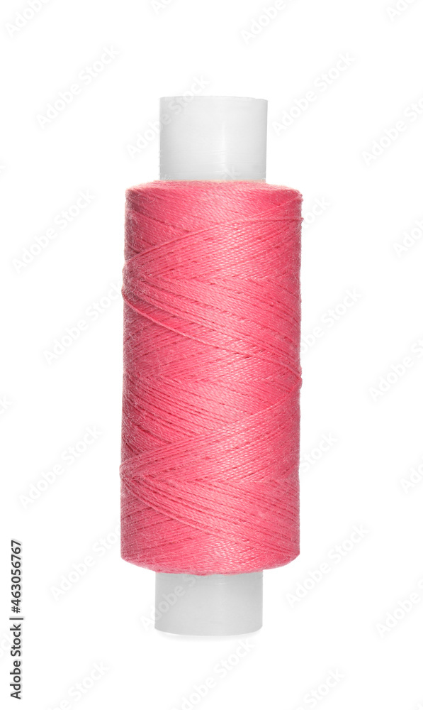 Spool of bright pink sewing thread isolated on white Spool of bright pink sewing thread isolated on white
