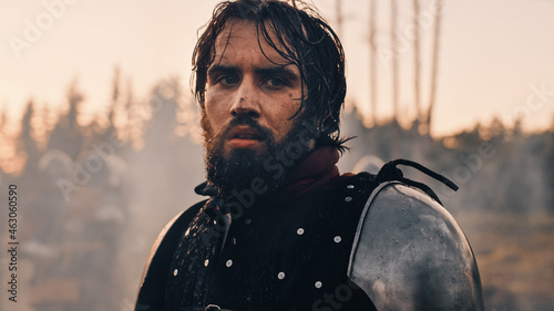 Fotografie Handsome Medieval Knight King on Battlefield, Looking at Camera