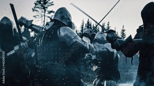 Epic Battlefield: Armies of Medieval Knights Fighting with Swords. Brutal Battle of Armored Warrior Soldiers Attacking Enemy. War, Warfare, Crusade. Cinematic Historical Reenactment.