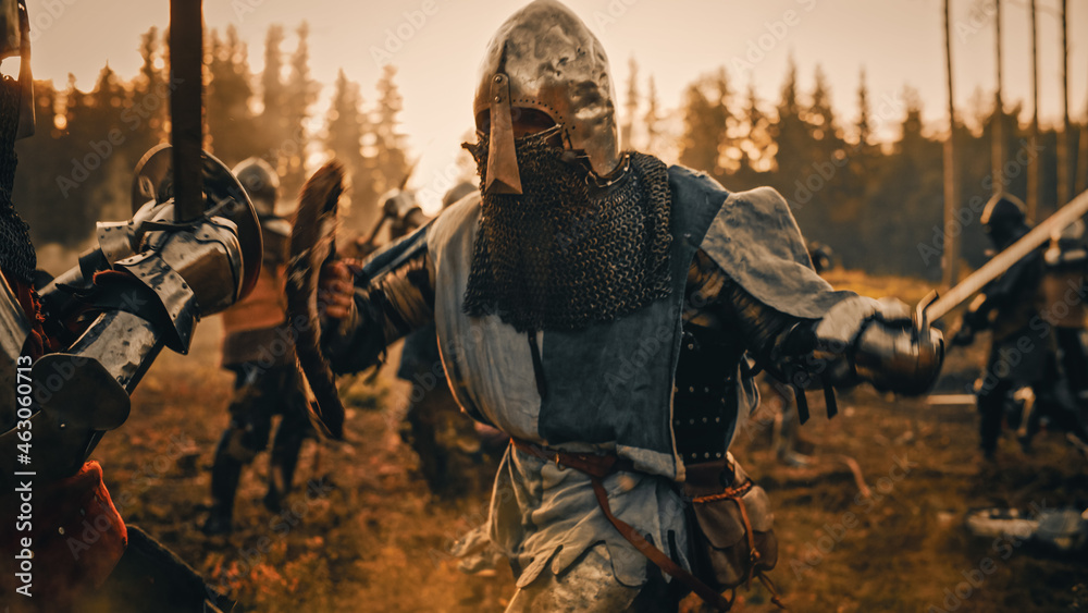 Epic Battlefield: Two Armored Medieval Knights Fighting with Swords. Dark Ages Army Warfare. Action Battle of Armored Warrior Soldiers, Killing Enemies. Cinematic Historical Reenactment. Epic Battlefield: Two Armored Medieval Knights Fighting with Swords. Dark Ages Army Warfare. Action Battle of Armored Warrior Soldiers, Killing Enemies. Cinematic Historical Reenactment.