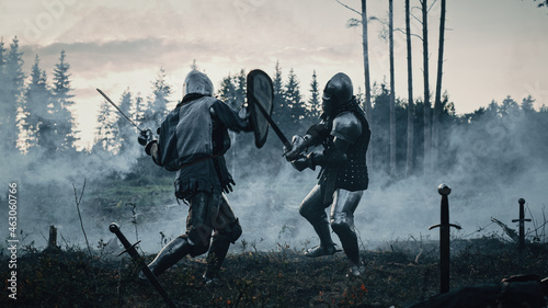 Принти на полотні Epic Battlefield: Two Armored Medieval Knights Fighting with Swords