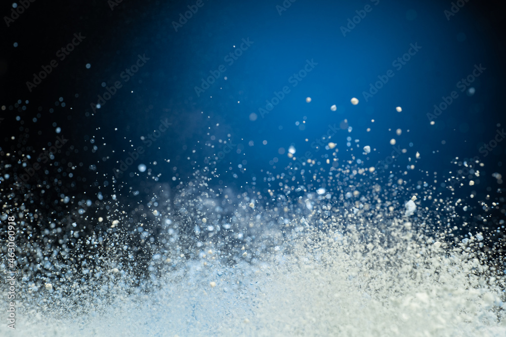 explosion of flour and components, lifting them into the air on a white surface explosion of flour and components, lifting them into the air on a white surface