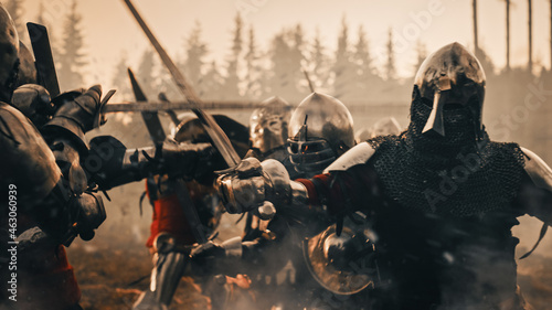 Epic Battlefield: Armies of Medieval Knights Fighting with Swords. Dark Age War, Crusade, Conquest. Bloody Battle of Savage Warrior Soldiers. Cinematic Historical Reenactment.